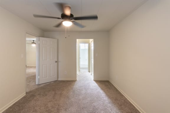 This is a photo of the bedroom in the 550 square foot 1 bedroom, 1 bath patio apartment at College Woods Apartments in the North College Hill neighborhood of Cincinnati, OH.