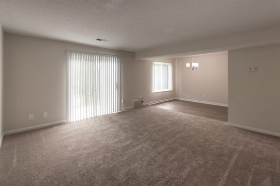 This is a photo of the dining room from the living room in an upgraded 950 square foot, 2 bedroom apartment at Deer Hill Apartments in Cincinnati, OH.