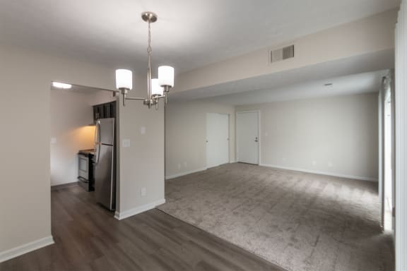 This is a photo of the living room from the dining room in an upgraded 950 square foot, 2 bedroom apartment at Deer Hill Apartments in Cincinnati, OH.