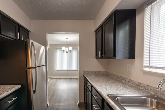 This is a photo of the kitchen in an upgraded 950 square foot, 2 bedroom apartment at Deer Hill Apartments in Cincinnati, OH.