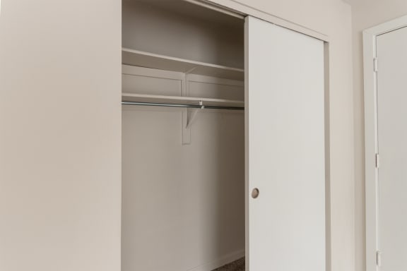 This is a photo of the living room closet in an upgraded 950 square foot, 2 bedroom apartment at Deer Hill Apartments in Cincinnati, OH.