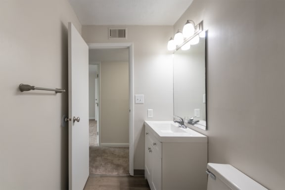 This is a photo of the bathroom in an upgraded 950 square foot, 2 bedroom apartment at Deer Hill Apartments in Cincinnati, OH.