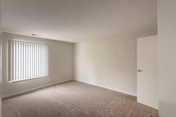 This is a photo of the primary bedroom in an upgraded 950 square foot, 2 bedroom apartment at Deer Hill Apartments in Cincinnati, OH.