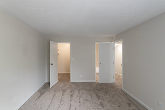 This is a photo of the primary bedroom in an upgraded 950 square foot, 2 bedroom apartment at Deer Hill Apartments in Cincinnati, OH.