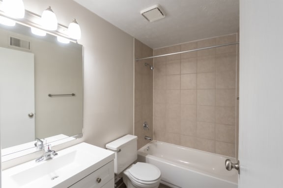 This is a photo of the primary bathroom in an upgraded 950 square foot, 2 bedroom apartment at Deer Hill Apartments in Cincinnati, OH.