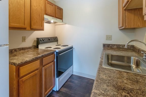 This is a photo of the kitchen in a 950 square foot, standard 2 bedroom apartment at Deer Hill Apartments in Cincinnati, OH.