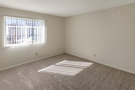 This is a photo of the bedroom of a 950 square foot, standard 2 bedroom apartment at Deer Hill Apartments in Cincinnati, OH.