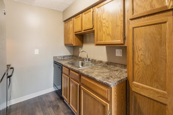 This is a photo of the kitchen of an upgraded 950 square foot, 2 bedroom apartment at Deer Hill Apartments in Cincinnati, OH.