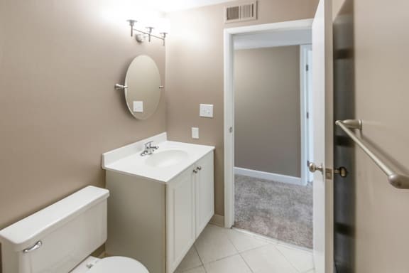 This is a photo of the bathroom of an upgraded 950 square foot, 2 bedroom apartment at Deer Hill Apartments in Cincinnati, OH.