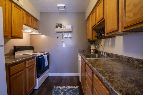 This is a photo of the kitchen in a 2 bedroom apartment at Deer Hill Apartments in Cincinnati, OH.