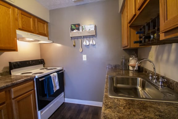 This is a photo of the kitchen in a 2 bedroom apartment at Deer Hill Apartments in Cincinnati, OH.