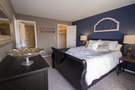 This is a photo of the master bedroom of a 2 bedroom apartment at Deer Hill Apartments in Cincinnati, OH.