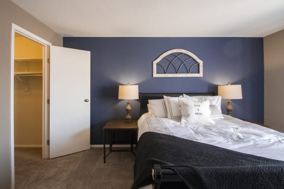 This is a photo of the master bedroom of a 2 bedroom apartment at Deer Hill Apartments in Cincinnati, OH.