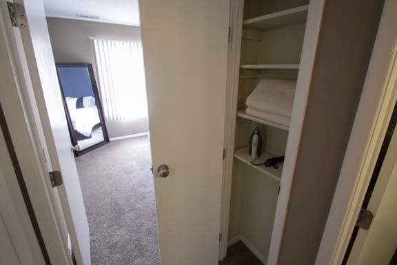 This is a photo of the hallway linen closet of a 2 bedroom apartment at Deer Hill Apartments in Cincinnati, OH.