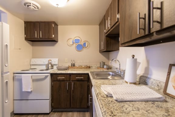 White Appliances In Kitchen at Fairfield Pointe, Ohio