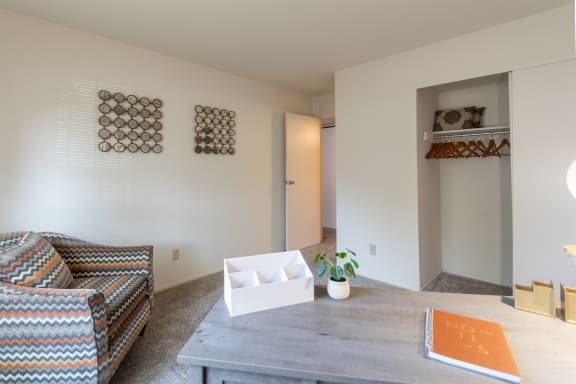 Living Room With Storage Area  at Fairfield Pointe, Fairfield