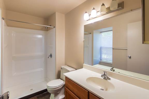 The primary bathroom in the 1460 square foot, 3 bedroom, 2 and a half bath townhome at Fairfield Pointe Apartments in Fairfield, OH.