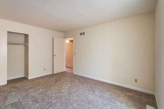 One of the two smaller bedrooms  n the 1460 square foot, 3 bedroom, 2 and a half bath townhome at Fairfield Pointe Apartments in Fairfield, OH.