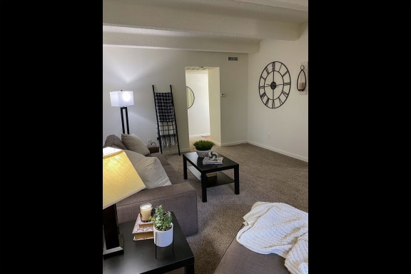 This is a photo of the living room in the 965 square foot 1 bedroom, 1 bath  apartment at Harvard Square Apartments, in the Vickery Meadow neighborhood of Dallas, TX.