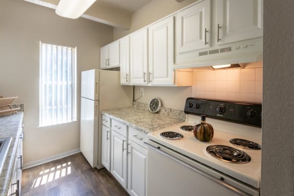 This is a photo of the kitchen in the 965 square foot 2 bedroom, 2 bath  apartment at Harvard Square Apartments, in Dallas, TX.