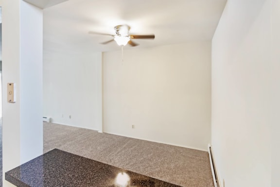 This is a photo of the dining area of a 1 bedroom, 631 square foot apartment at Lake of the Woods Apartments in Cincinnati, OH.