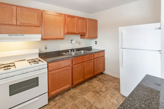 This is a photo of the kitchen of a 2 bedroom, 758 square foot apartment at Lake of the Woods Apartments in Cincinnati, OH.
