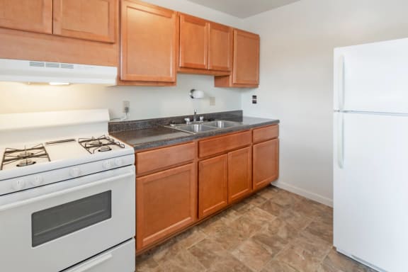 This is a photo of the kitchen of a 2 bedroom, 758 square foot apartment at Lake of the Woods Apartments in Cincinnati, OH.