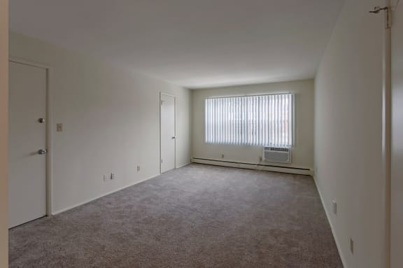 This is a photo of the living room of a 2 bedroom, 758 square foot apartment at Lake of the Woods Apartments in Cincinnati, OH.