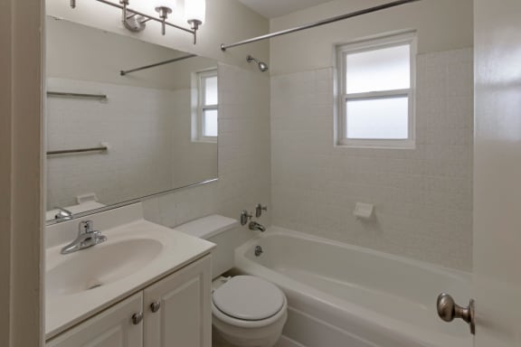 This is a photo of the bathroom of a 2 bedroom, 758 square foot apartment at Lake of the Woods Apartments in Cincinnati, OH.