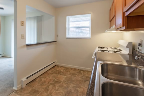 This is a photo of the kitchen of a 2 bedroom, 758 square foot apartment at Lake of the Woods Apartments in Cincinnati, OH.
