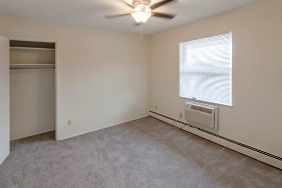 This is a photo of the bedroom of a 2 bedroom, 758 square foot apartment at Lake of the Woods Apartments in Cincinnati, OH.