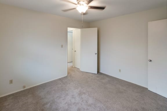 This is a photo of the bedroom of a 2 bedroom, 758 square foot apartment at Lake of the Woods Apartments in Cincinnati, OH.