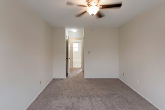 This is a photo of the master bedroom of a 2 bedroom, 758 square foot apartment at Lake of the Woods Apartments in Cincinnati, OH.