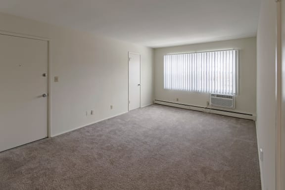 This is a photo of the living room of a 2 bedroom, 758 square foot apartment at Lake of the Woods Apartments in Cincinnati, OH.