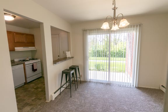 This is a photo of the dining room in the 758 square foot, 2 bedroom floor plan at Lake of the Woods Apartments in Cincinnati, OH.