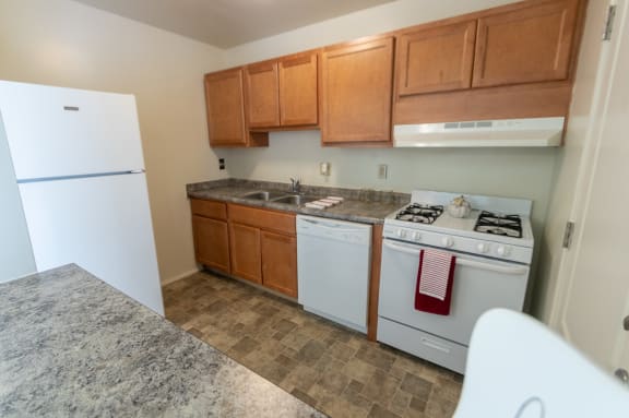 This is a photo of the kitchen in the 758 square foot, 2 bedroom floor plan at Lake of the Woods Apartments in Cincinnati, OH.