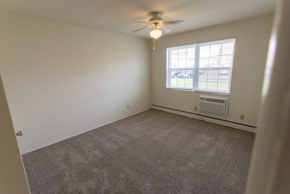 This is a photo of the master bedroom in the 758 square foot, 2 bedroom floor plan at Lake of the Woods Apartments in Cincinnati, OH.
