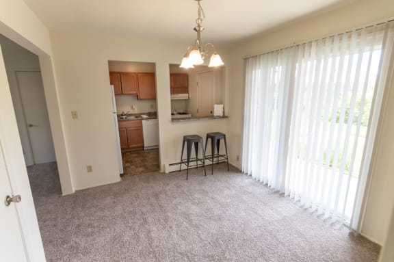 This is a photo of the dining room in the 758 square foot, 2 bedroom floor plan at Lake of the Woods Apartments in Cincinnati, OH.