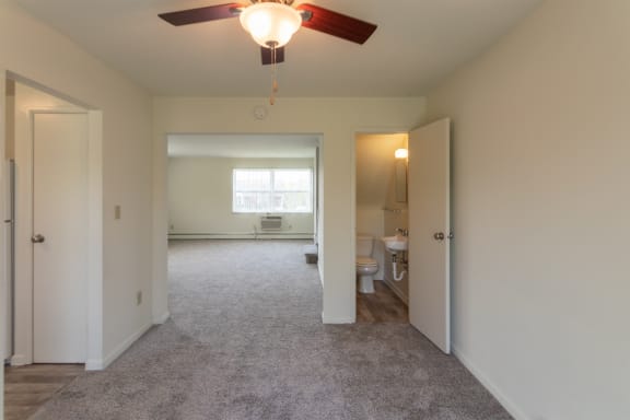 This is a photo of the dining room in the 1229 square foot, 3 bedroom, 2.5 bath townhome floor plan at Lake of the Woods Apartments in Cincinnati, OH.