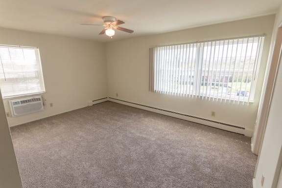 This is a photo of the master bedroom in the 1229 square foot, 3 bedroom, 2.5 bath townhome floor plan at Lake of the Woods Apartments in Cincinnati, OH.
