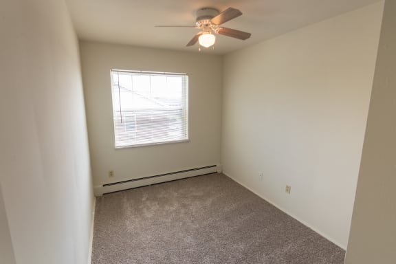 This is a photo of the third bedroom in the 1229 square foot, 3 bedroom, 2.5 bath townhome floor plan at Lake of the Woods Apartments in Cincinnati, OH.
