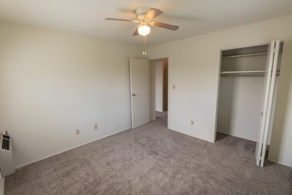 This is a photo of the second bedroom in the 1229 square foot, 3 bedroom, 2.5 bath townhome floor plan at Lake of the Woods Apartments in Cincinnati, OH.