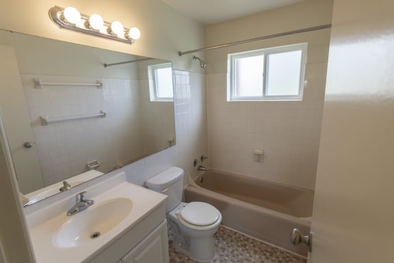 This is a photo of the bathroom in the 1229 square foot, 3 bedroom, 2.5 bath townhome floor plan at Lake of the Woods Apartments in Cincinnati, OH.