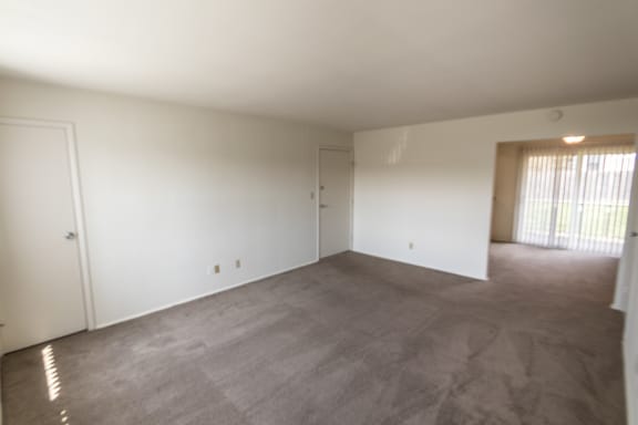 This is a photo of the living room in the 966 square foot, 2 bedroom, 1 bath floor plan at Lake of the Woods Apartments in Cincinnati, OH.