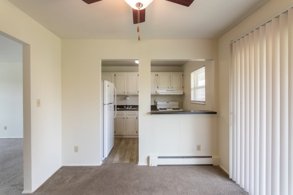 This is a photo of the dining room in the 966 square foot, 2 bedroom, 1 bath floor plan at Lake of the Woods Apartments in Cincinnati, OH.