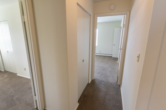This is a photo of the hallway in the 966 square foot, 2 bedroom, 1 bath floor plan at Lake of the Woods Apartments in Cincinnati, OH.