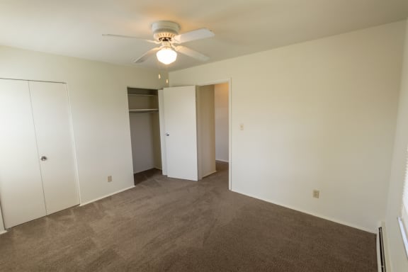 This is a photo of the master bedroom in the 966 square foot, 2 bedroom, 1 bath floor plan at Lake of the Woods Apartments in Cincinnati, OH.