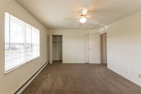 This is a photo of the master bedroom in the 966 square foot, 2 bedroom, 1 bath floor plan at Lake of the Woods Apartments in Cincinnati, OH.