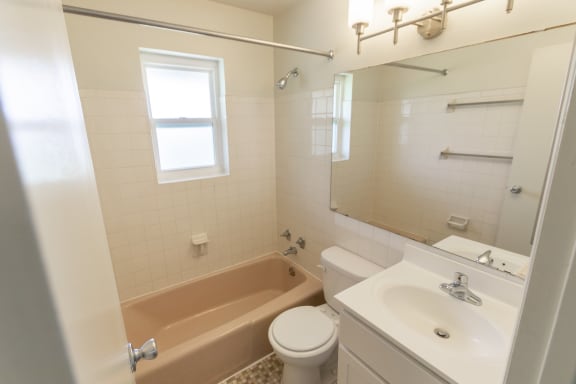 This is a photo of the bathroom in the 966 square foot, 2 bedroom, 1 bath floor plan at Lake of the Woods Apartments in Cincinnati, OH.