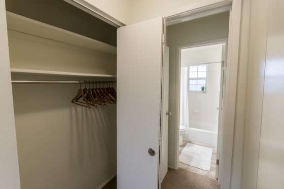 This is a photo of the one of the bedroom closets of the 1 bedroom, 631 square foot model apartment at Lake of the Woods Apartments in Cincinnati, OH.